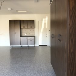 Matt's Closets, Cabinets & Coatings - Walnut cabinets with matching floor!