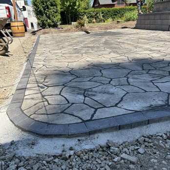 Terrascapes  - Custom patio using Belgard mega-arbel - Landscaping Near Me