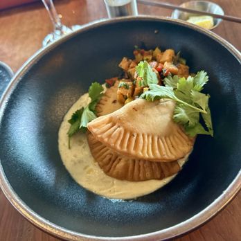 Redfish - EMPANADAS PULLED CHICKEN AND AGED WHITE CHEDDAR EMPANADAS WITH GRILLED SWEET POTATO SALSA AND CHARRED GARLIC CREAM - Seafood Near Me - Port Orford, Oregon