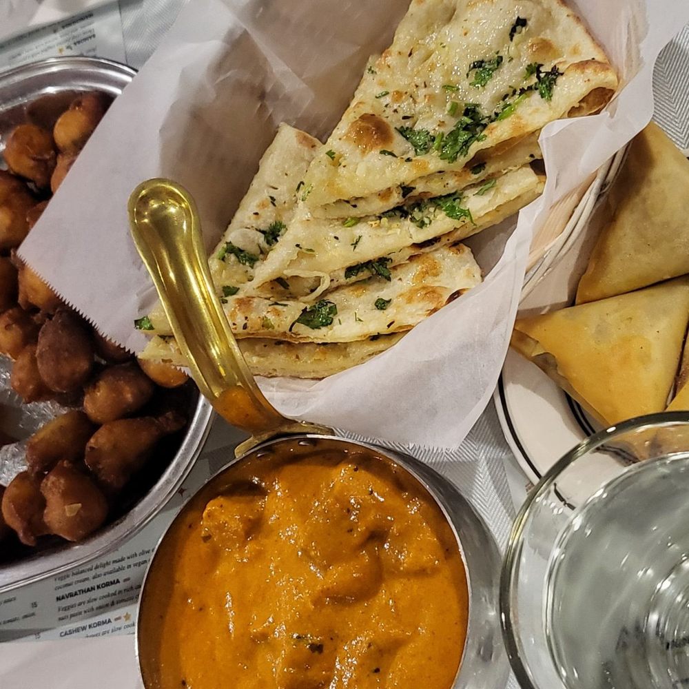 185th & Indian - Punugulu, butter chicken, garlic butter Naan and samosas - Indian Near Me - Beaverton, Oregon