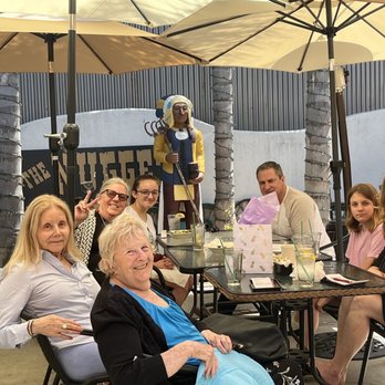 The Nugget - Patio with chief - American Near Me - Goleta, California
