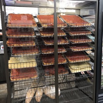 Deli La Trattoria - Pizza rack (breads almost all sold out for day) - Canadian (New) Near Me - Kirkland, Quebec Deli La Trattoria - Pizza rack (breads almost all sold out for day) - Canadian (New) Near Me - Kirkland, Quebec