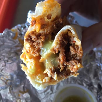 Taco Joint - Chorizo and egg with tomatillo salsa. Not so photogenic but the flavor is out of sight. - Tex-Mex Near Me - Dallas, Texas Taco Joint - Chorizo and egg with tomatillo salsa. Not so photogenic but the flavor is out of sight. - Tex-Mex Near Me - Dallas, Texas