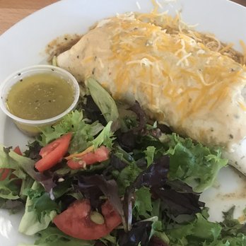 Tina's Cafe - Green chili pork burrito smothered in Tina's green chili cream sauce. Soooo good. - Breakfast & Brunch Near Me - Ruidoso, New Mexico Tina's Cafe - Green chili pork burrito smothered in Tina's green chili cream sauce. Soooo good. - Breakfast & Brunch Near Me - Ruidoso, New Mexico