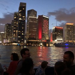 Paul's Miami Boat Tours - The Miami skyline lights up at sunset!