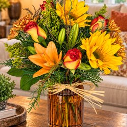 Miss Daisy's Floral & Event Decor - Capture the warmth and beauty of the season with Amber Autumn Glow. Perfect for Thanksgiving or celebrating everything we love about fall.