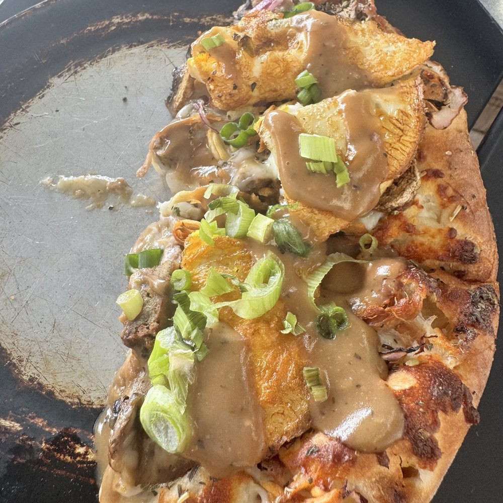 half of our Loco Moco pizza... half of our Loco Moco pizza...