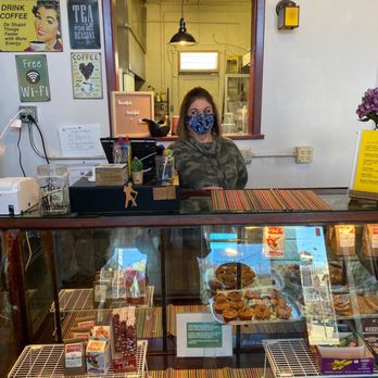 Birdwell's Vintage Vibes - a woman taking a selfie in front of a bakery counter - Coffee & Tea Near Me - Silver City, New Mexico