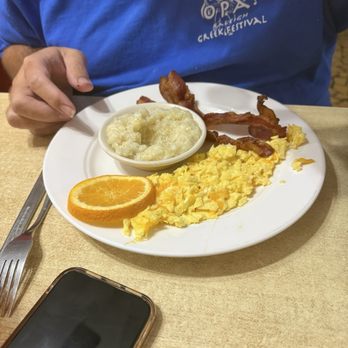 Pam's Farm House - Standard scrambled with cheese, grits and bacon - Southern Near Me - Raleigh, North Carolina Pam's Farm House - Standard scrambled with cheese, grits and bacon - Southern Near Me - Raleigh, North Carolina