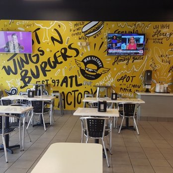 WNB Factory - Gainesville - the interior of a restaurant - Chicken Wings Near Me - Gainesville, Georgia WNB Factory - Gainesville - the interior of a restaurant - Chicken Wings Near Me - Gainesville, Georgia