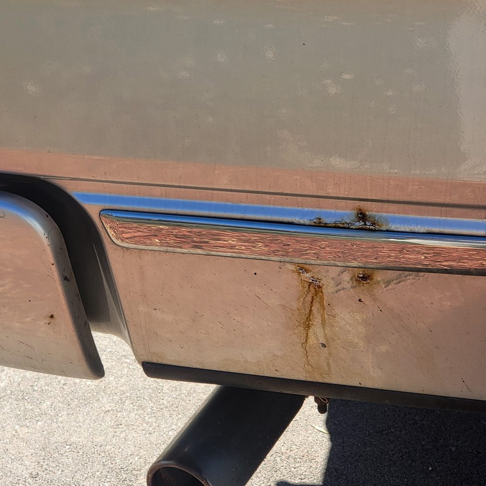 Iron Mountain Collision - Rust starting to take over the Passenger rear. - Body Shops Near Me - Loveland, Colorado Iron Mountain Collision - Rust starting to take over the Passenger rear. - Body Shops Near Me - Loveland, Colorado