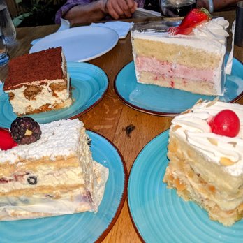 The Oasis Cafe - Tiramisu, Strawberry Tres Leches Cake,  Napoleon w.fruit & Amygdalou...all excellent! (Prices ranged from $6.50-$7.50 each) - Cafes Near Me - Flushing, New York