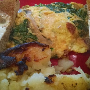 Jim's On Main - Spinach, bacon, mushroom, swiss omelette with their version if well done potato. - Breakfast & Brunch Near Me - Rochester, New York Jim's On Main - Spinach, bacon, mushroom, swiss omelette with their version if well done potato. - Breakfast & Brunch Near Me - Rochester, New York
