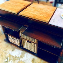 Bramble Home Store - Kitchen Island with two (partially) extended tables and three utensil drawers (underneath them).