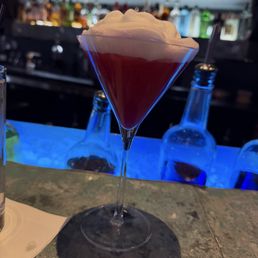 Prickly pear martini with lime foam