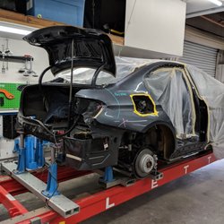 Photo of Gene's Import Auto Body - Sand City, CA, US. BMW getting repair