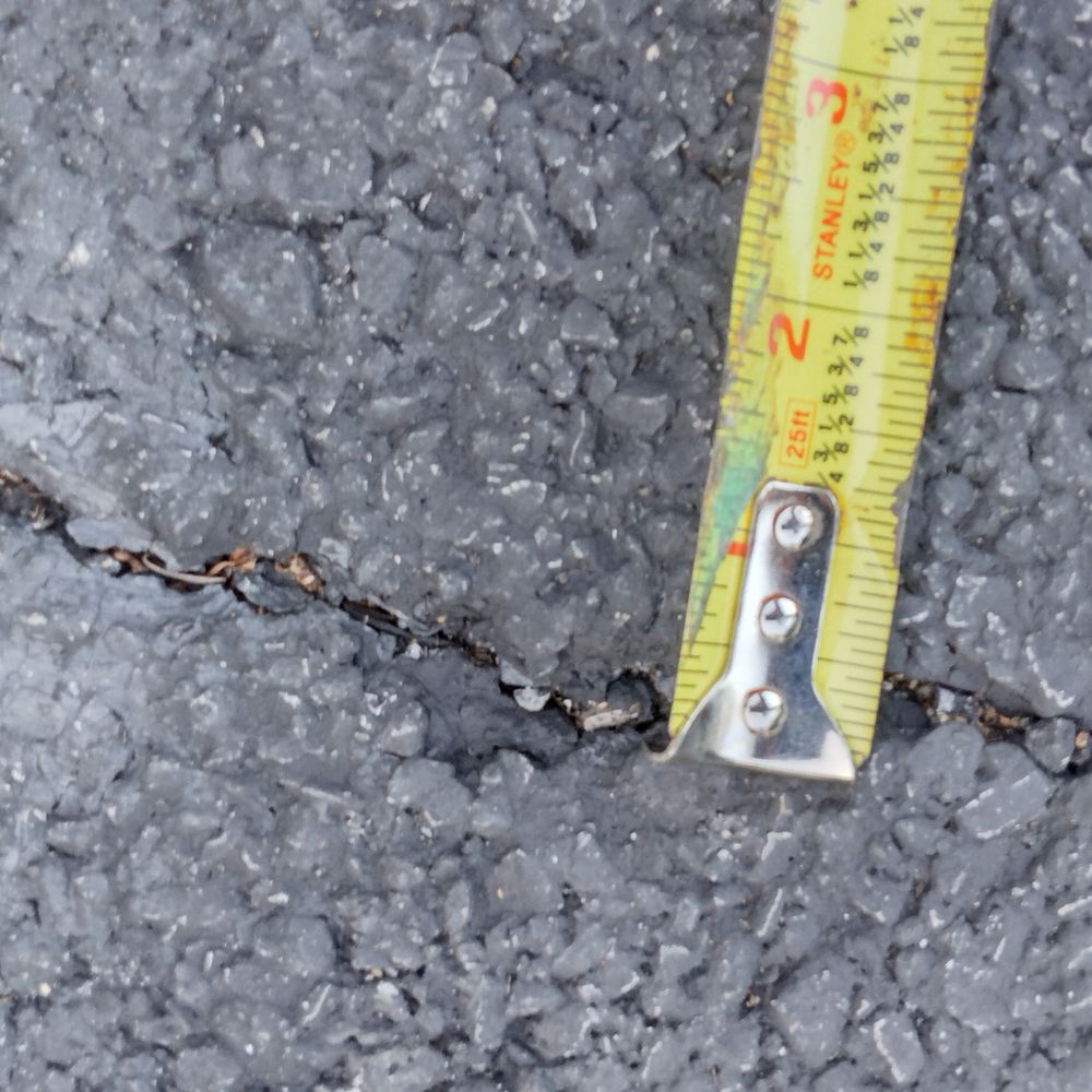 Manor Paving - .25 inch crack over 8ft long in my 2 year old driveway - Masonry/Concrete Near Me - Mount Vernon, New York Manor Paving - .25 inch crack over 8ft long in my 2 year old driveway - Masonry/Concrete Near Me - Mount Vernon, New York