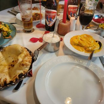 Radhuni - Left: chicken biryani and peshwari naan Center: chicken korma and coconut rice Back left: chicken zeera - Indian Near Me - South Shields, XTW