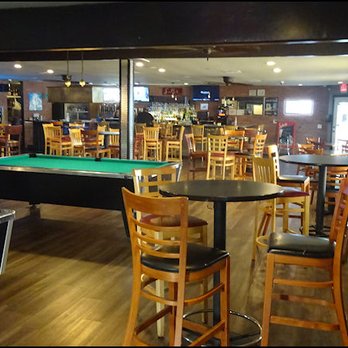 Sully's Bar and Grill - The bar is at the front of the restaurant, and the dining room is GIGANTIC, and is furnished with many tall tables and chairs. - Bars Near Me - Rocklin, California Sully's Bar and Grill - The bar is at the front of the restaurant, and the dining room is GIGANTIC, and is furnished with many tall tables and chairs. - Bars Near Me - Rocklin, California
