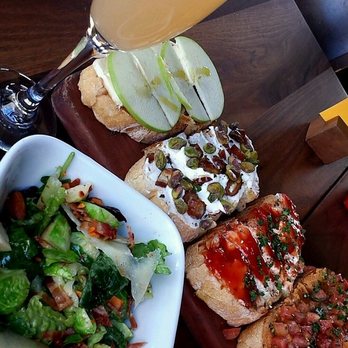 Postino Arcadia - Brussel sprout salad and a bruschetta board, yum! - Wine Bars Near Me - Phoenix, Arizona