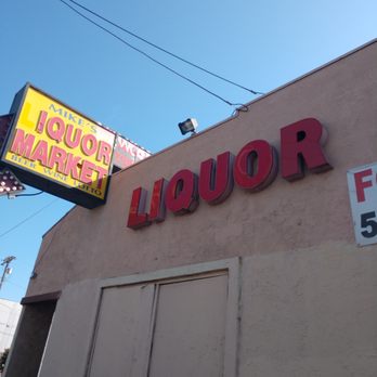 Mike's liquor - a neon sign on the side of a building - Beer, Wine & Spirits Near Me - Sun Valley, California Mike's liquor - a neon sign on the side of a building - Beer, Wine & Spirits Near Me - Sun Valley, California