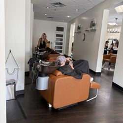 J Michael's Spa and Salon - The shampoo area (comfy chairs with to foot stools)