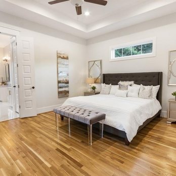 Noble Contractor Solutions - master bedroom with hardwood floors - General Contractors Near Me