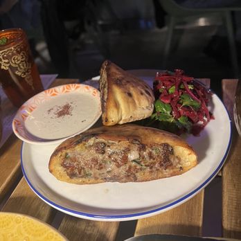 Shukette - Arayes, a lamb and beef pita - Middle Eastern Near Me - New York, New York Shukette - Arayes, a lamb and beef pita - Middle Eastern Near Me - New York, New York