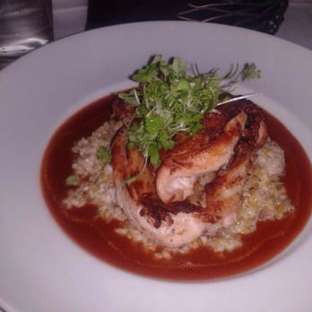 Frog Hollow Tavern - Delicious baked Chicken on Risotto with a very flavorful tomato sauce. - Wine Bars Near Me - Augusta, Georgia Frog Hollow Tavern - Delicious baked Chicken on Risotto with a very flavorful tomato sauce. - Wine Bars Near Me - Augusta, Georgia