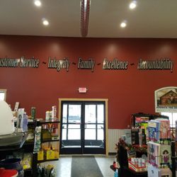 Windridge Textile Printing - At least four foot long vinyl letter in Tri County Feed new facility.