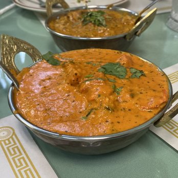 paradise Indian restaurant & sweet - Butter chicken and lamb tikka masala in the back. Both delicious! - Indian Near Me - Sobrante, California paradise Indian restaurant & sweet - Butter chicken and lamb tikka masala in the back. Both delicious! - Indian Near Me - Sobrante, California