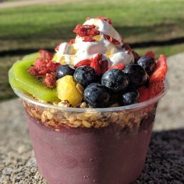 Fruitful acai bowl - kiwi, strawberries, goji berries, pineapple, blue berries, granola, coconut whipped cream Fruitful acai bowl - kiwi, strawberries, goji berries, pineapple, blue berries, granola, coconut whipped cream