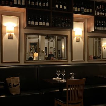 The Parisian Restaurant & Wine Bar - tables and chairs - French Near Me - Jupiter, Florida The Parisian Restaurant & Wine Bar - tables and chairs - French Near Me - Jupiter, Florida