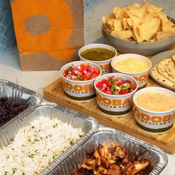 QDOBA Mexican Eats - Family Meals come with all of the fixings to make flavorful tacos or bowls for 4-5 people. - Mexican Near Me - Fairfax, Virginia QDOBA Mexican Eats - Family Meals come with all of the fixings to make flavorful tacos or bowls for 4-5 people. - Mexican Near Me - Fairfax, Virginia