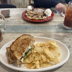 Tuscan Cafe - The Warwick sandwich with Chocolate chip pancakes in the background.