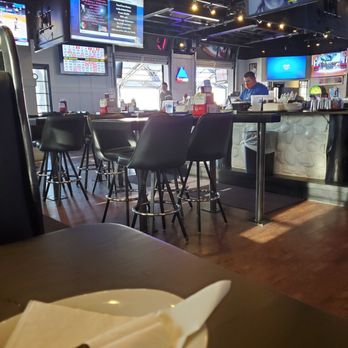 Tanner's Bar & Grill - Omaha - Bar tables and booths - Chicken Wings Near Me - Omaha, Nebraska Tanner's Bar & Grill - Omaha - Bar tables and booths - Chicken Wings Near Me - Omaha, Nebraska