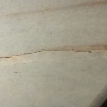 Surface Expressions - Crack in island countertop - Countertop Installation Near Me - Ludington, Michigan Surface Expressions - Crack in island countertop - Countertop Installation Near Me - Ludington, Michigan