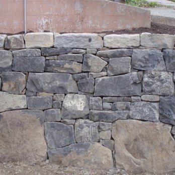 Goddard Stonework - a closeup of a stone wall - Masonry/Concrete Near Me