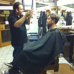 Colman Building Barbershop - Mark Oshana Badal, James Coleman and Johan Silva at Colman Barbership in Seattle, Washington USA