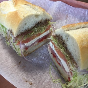 Giovannis Deli - Mozzarella prosciutto red peppers lettuce tomato onion and balsamic - Delis Near Me - Secaucus, New Jersey