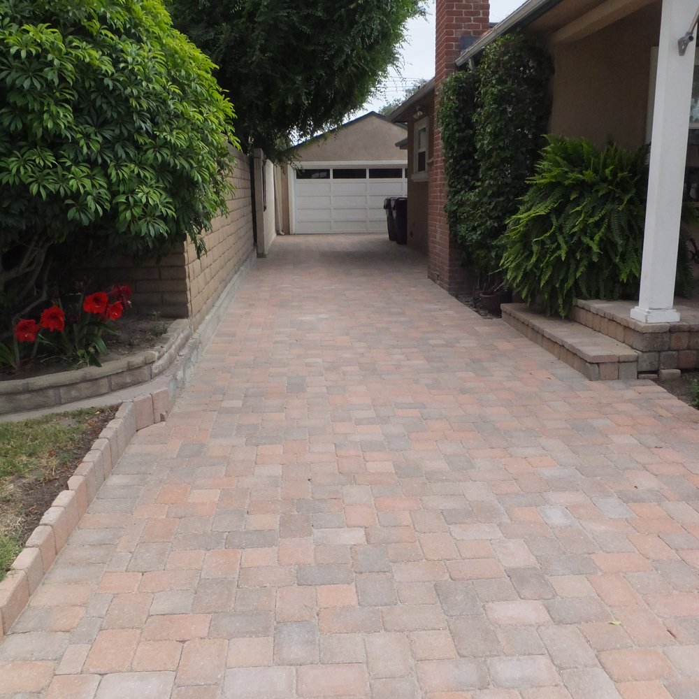 These pavers match the earlier pavers installed on the front porch, back yard patio and porch step plus walkway in 2008