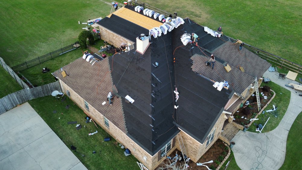 Slide of RainTight Roofing & Construction