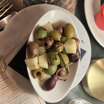 Cheesetique - Warm Olives & Manchego. THIS WAS THE BEST THING WE HAD ALL NIGHT! Highly recommend this menu item. - Cheese Shops Near Me - Alexandria, Virginia