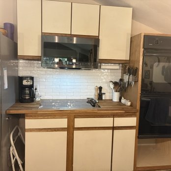 Padilla’s Remodeling - The new cabinet for our double ovens. - General Contractors Near Me