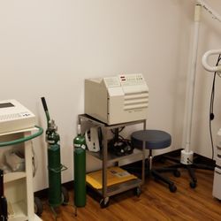 Adventist Health Castle Urgent Care - Exam room with new EKG machine, Autoclave/Sterilizer