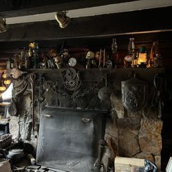 Bunk House Lodge - The cozy and quirky fireplace in the den