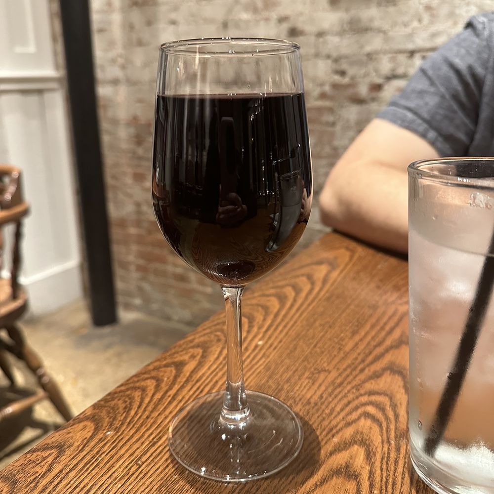 Eno's Pizza Tavern - Heavy pour or small wine glass? I think both and I was very excited to also find out this was on happy hour - Pizza Near Me - Forney, Texas