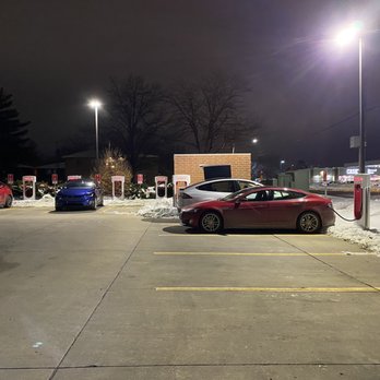 Tesla Supercharger - Tesla Supercharger Station in Coralville, IA. Located in the parking lot of Hy-Vee. - EV Charging Stations Near Me - Coralville, Iowa Tesla Supercharger - Tesla Supercharger Station in Coralville, IA. Located in the parking lot of Hy-Vee. - EV Charging Stations Near Me - Coralville, Iowa