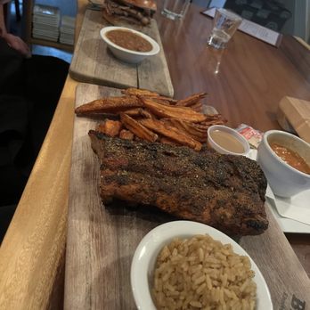 Smoky Rock Barbeque - Dry Baby Back ribs with Sweet Potato Fries and rice in the front, and tomato garlic soup. - Barbeque Near Me - Rhinebeck, New York Smoky Rock Barbeque - Dry Baby Back ribs with Sweet Potato Fries and rice in the front, and tomato garlic soup. - Barbeque Near Me - Rhinebeck, New York