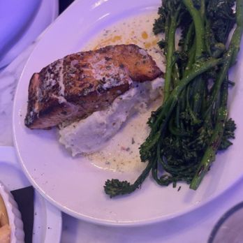 Sea Salt Seafood Lounge - Salmon over mashed with a garlic sauce & broccolini - Seafood Near Me - Atlanta, Georgia Sea Salt Seafood Lounge - Salmon over mashed with a garlic sauce & broccolini - Seafood Near Me - Atlanta, Georgia